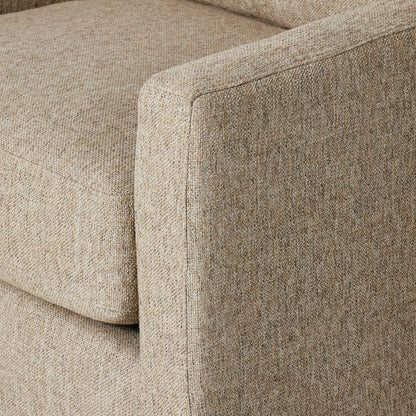 Hampton Swivel Chair by Four Hands in delta sand. Made from 97.42% olefin 2.58% polyester, pine plywood, 100% polyester in a modern style.