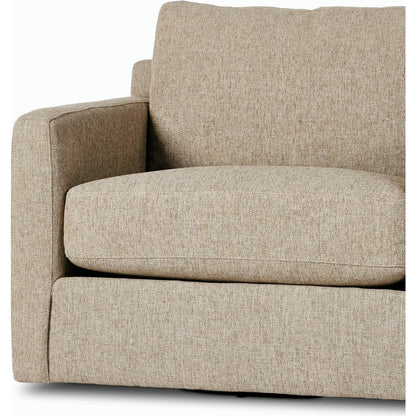 Hampton Swivel Chair by Four Hands in delta sand. Made from 97.42% olefin 2.58% polyester, pine plywood, 100% polyester in a modern style.