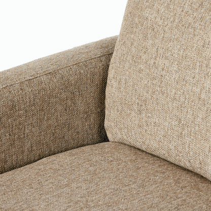 Hampton Swivel Chair by Four Hands in delta sand. Made from 97.42% olefin 2.58% polyester, pine plywood, 100% polyester in a modern style.