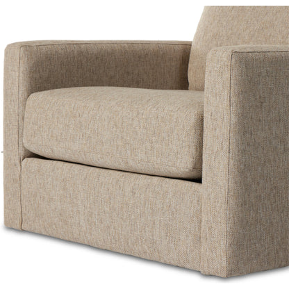 Hampton Swivel Chair by Four Hands in delta sand. Made from 97.42% olefin 2.58% polyester, pine plywood, 100% polyester in a modern style.