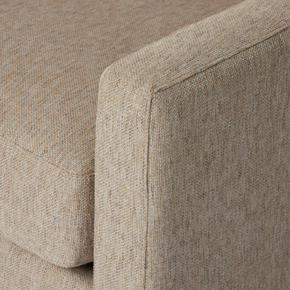 Hampton Swivel Chair by Four Hands in delta sand. Made from 97.42% olefin 2.58% polyester, pine plywood, 100% polyester in a modern style.