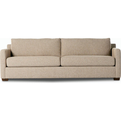 Hampton Sofa by Four Hands in delta sand. Made from 97.42% olefin 2.58% polyester, pine plywood, 100% polyester in a modern style.