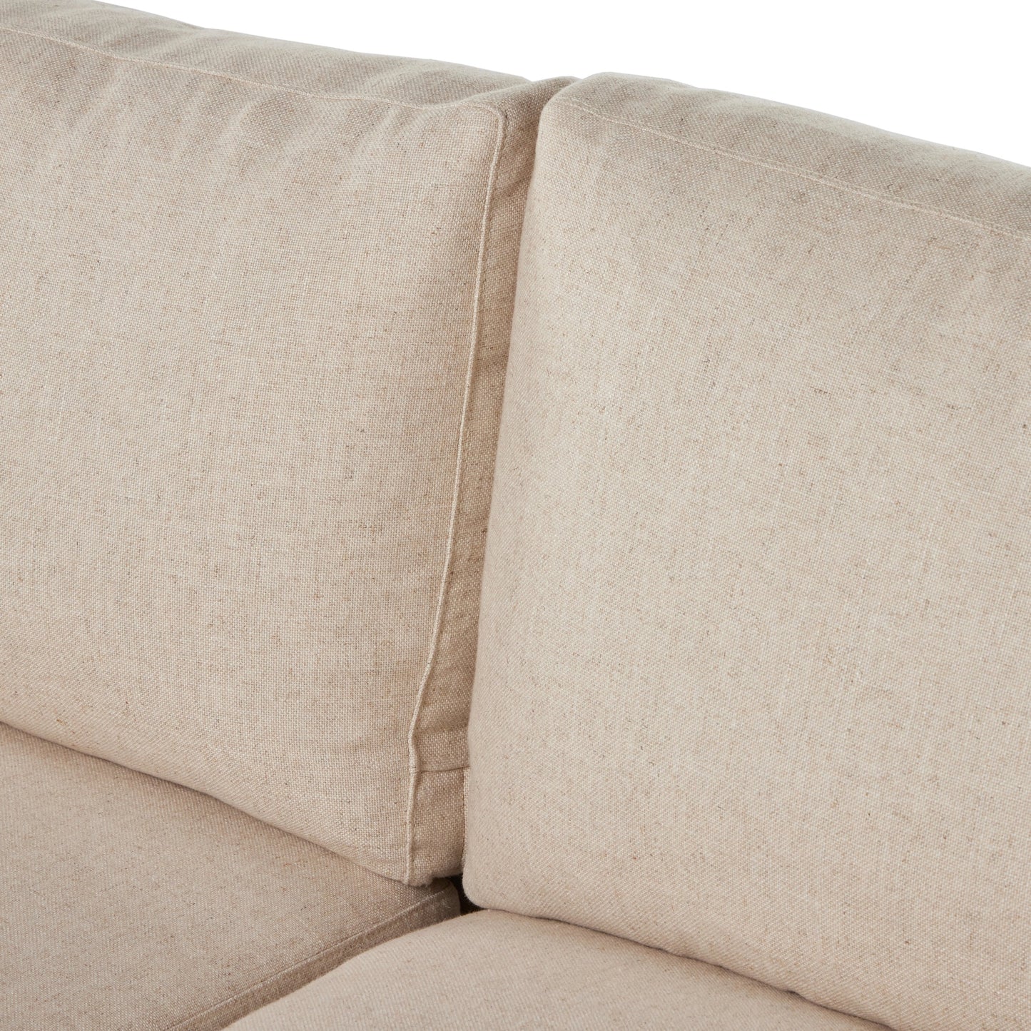 010 SI-2001429 | Closeup | Hampton Slipcover Sofa by Four Hands in evere oatmeal. Made from 51% rayon, 22% linen, 16% polyester, 11% cotton, pine plywood, 100% polyester in a modern style.