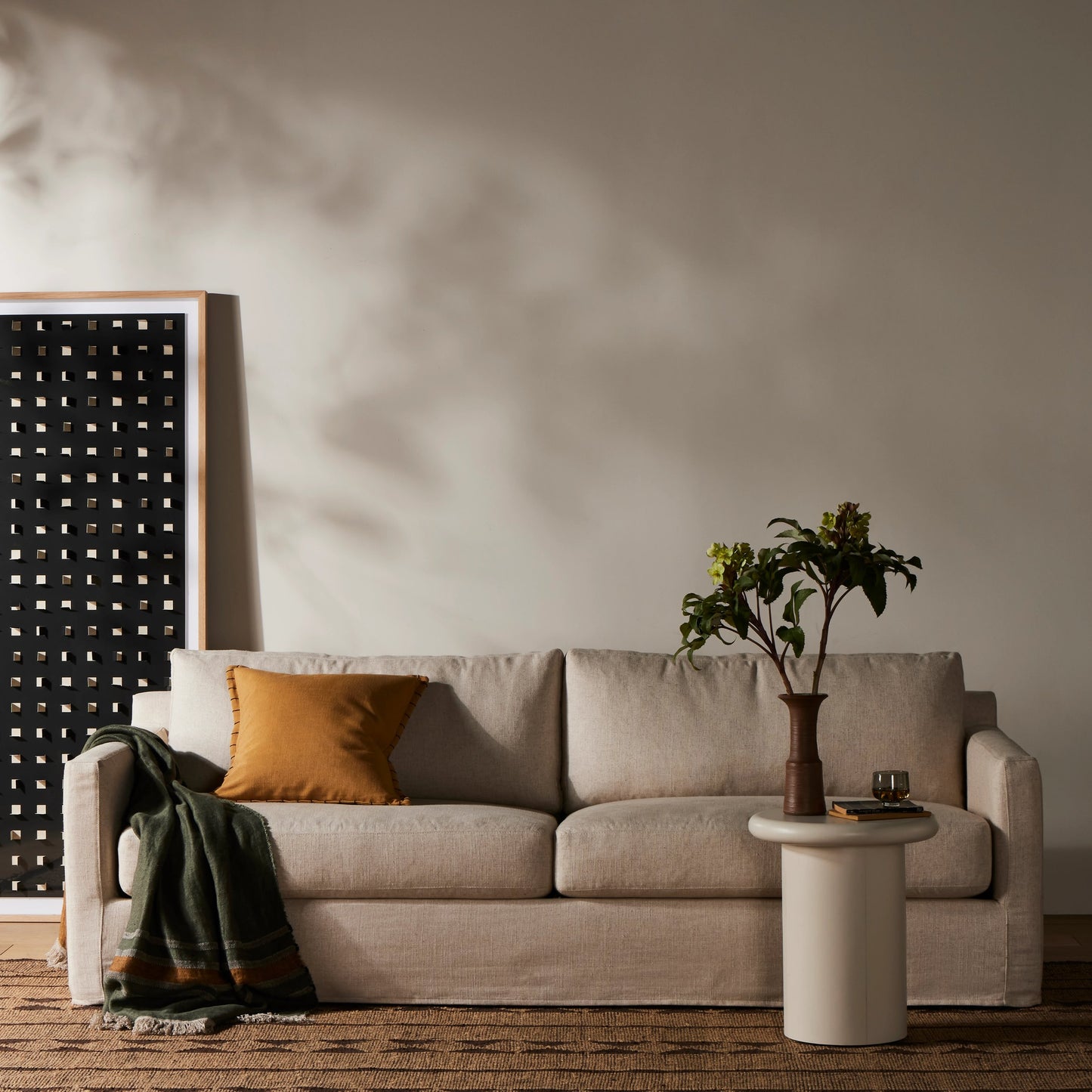 006 SI-2001429 | Lifestyle | Hampton Slipcover Sofa by Four Hands in evere oatmeal. Made from 51% rayon, 22% linen, 16% polyester, 11% cotton, pine plywood, 100% polyester in a modern style.