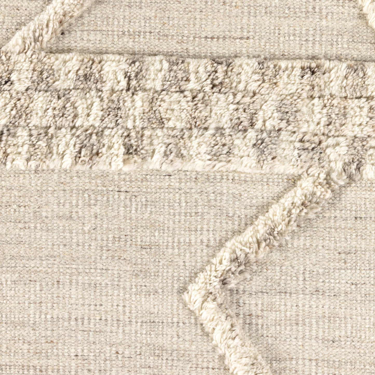 003 SI-2001581,SI-2001582,SI-2001583 | Closeup | Lovato Hand Knotted Rug by Four Hands in lovato. Made from 100% wool in a unique style.