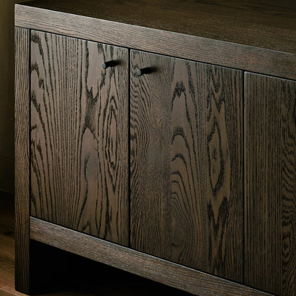 Torrington Media Console by Four Hands in umber oak, umber oak veneer and umber oak. Made from resawn oak, oak veneer in a modern style.