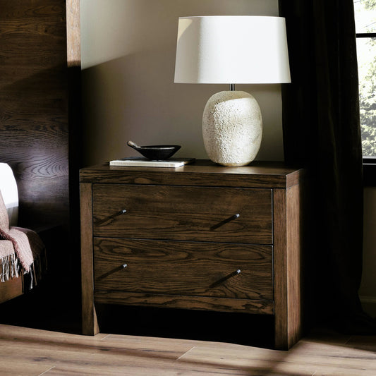 Torrington Charging Nightstand by Four Hands in umber oak, umber oak veneer and umber oak. Made from resawn oak, oak veneer in a modern style.