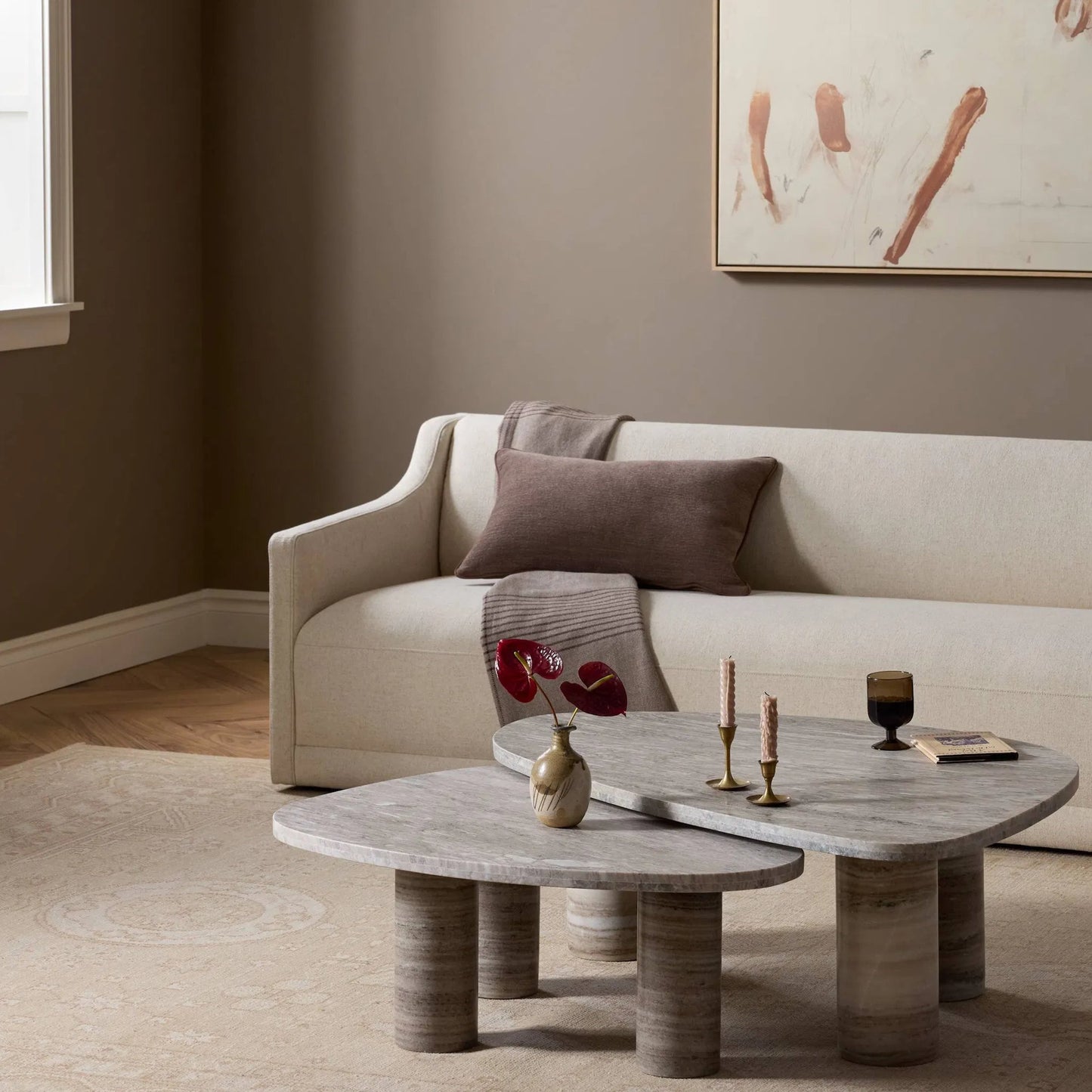 007 SI-2628496,SI-2628497 | Lifestyle | Zion Nesting Coffee Table by Four Hands in antique white marble. Made from solid marble in a unique style.