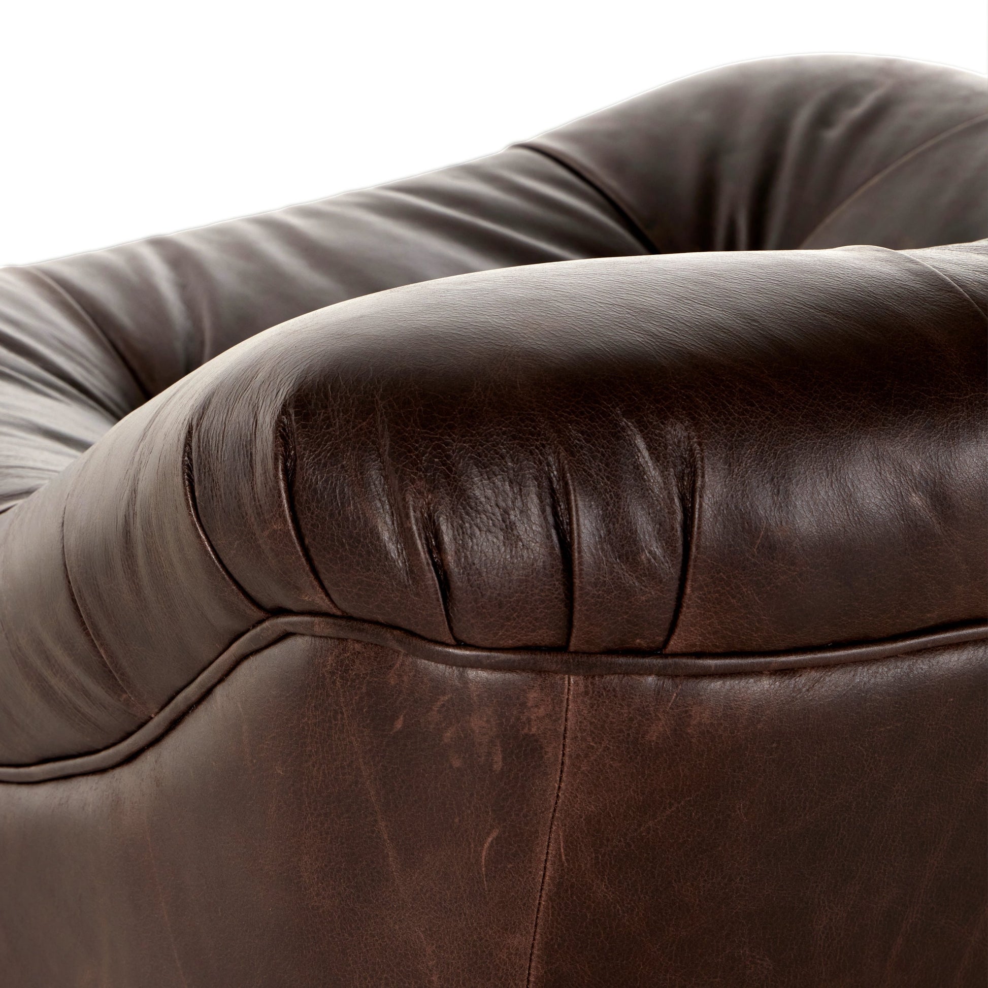 Farley Swivel Chair by Four Hands in conroe cigar. Made from top grain leather, poplar plywood, 100% polyester in a traditional style.