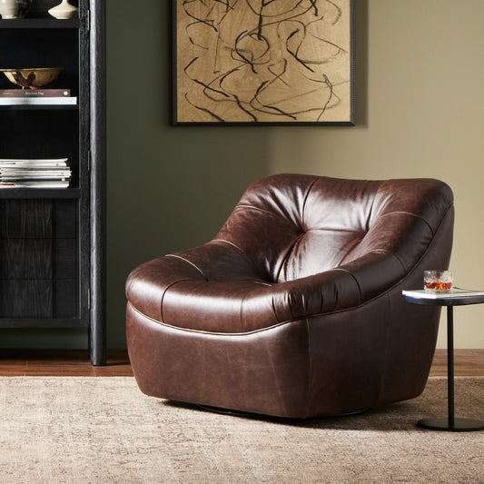 Farley Swivel Chair by Four Hands in conroe cigar. Made from top grain leather, poplar plywood, 100% polyester in a traditional style.