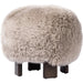 Alma Ottoman by Four Hands in vintage parawood. Made from unique in a transitional style.