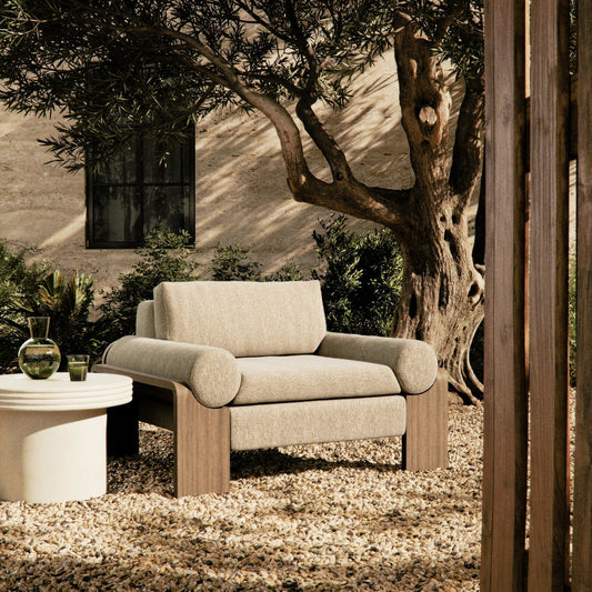 Joette Outdoor Chair by Four Hands. Made from 100% olefin, solid fsc®-certified teak, 59% polyurethane foam, 30% polyester fiber, 11% polyester fiber batting in a modern style.