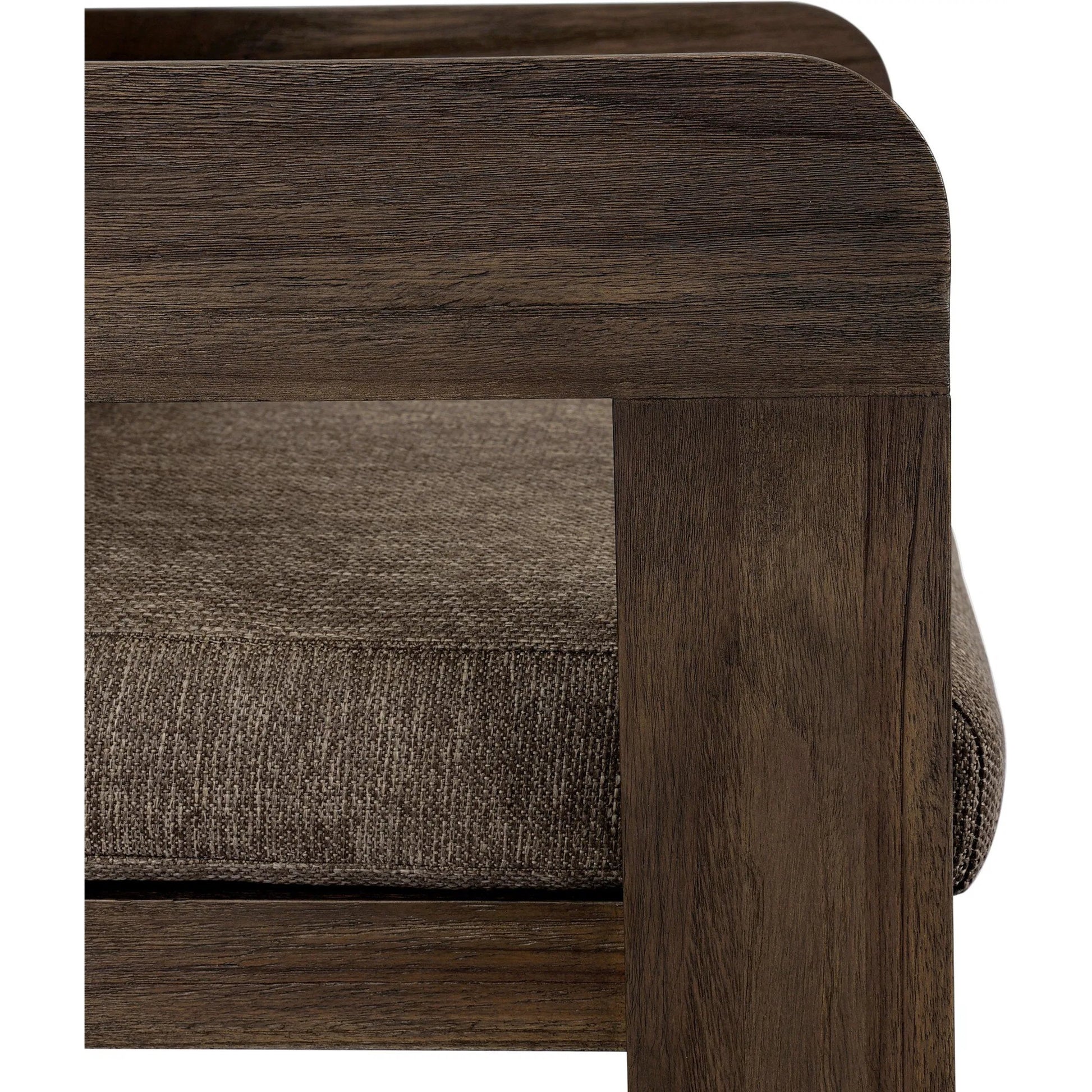 Jackson Outdoor Dining Chair by Four Hands. Made from 100% olefin, solid fsc®-certified teak, 90% polyester fiber, 10% polyester fiber batting in a modern style.