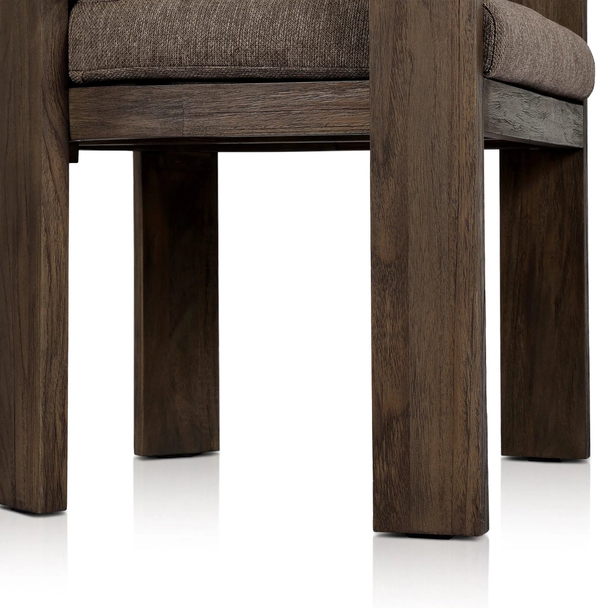 Jackson Outdoor Dining Chair by Four Hands. Made from 100% olefin, solid fsc®-certified teak, 90% polyester fiber, 10% polyester fiber batting in a modern style.