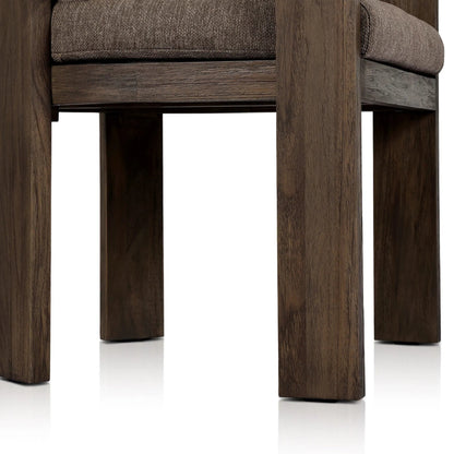 Jackson Outdoor Dining Chair by Four Hands. Made from 100% olefin, solid fsc®-certified teak, 90% polyester fiber, 10% polyester fiber batting in a modern style.