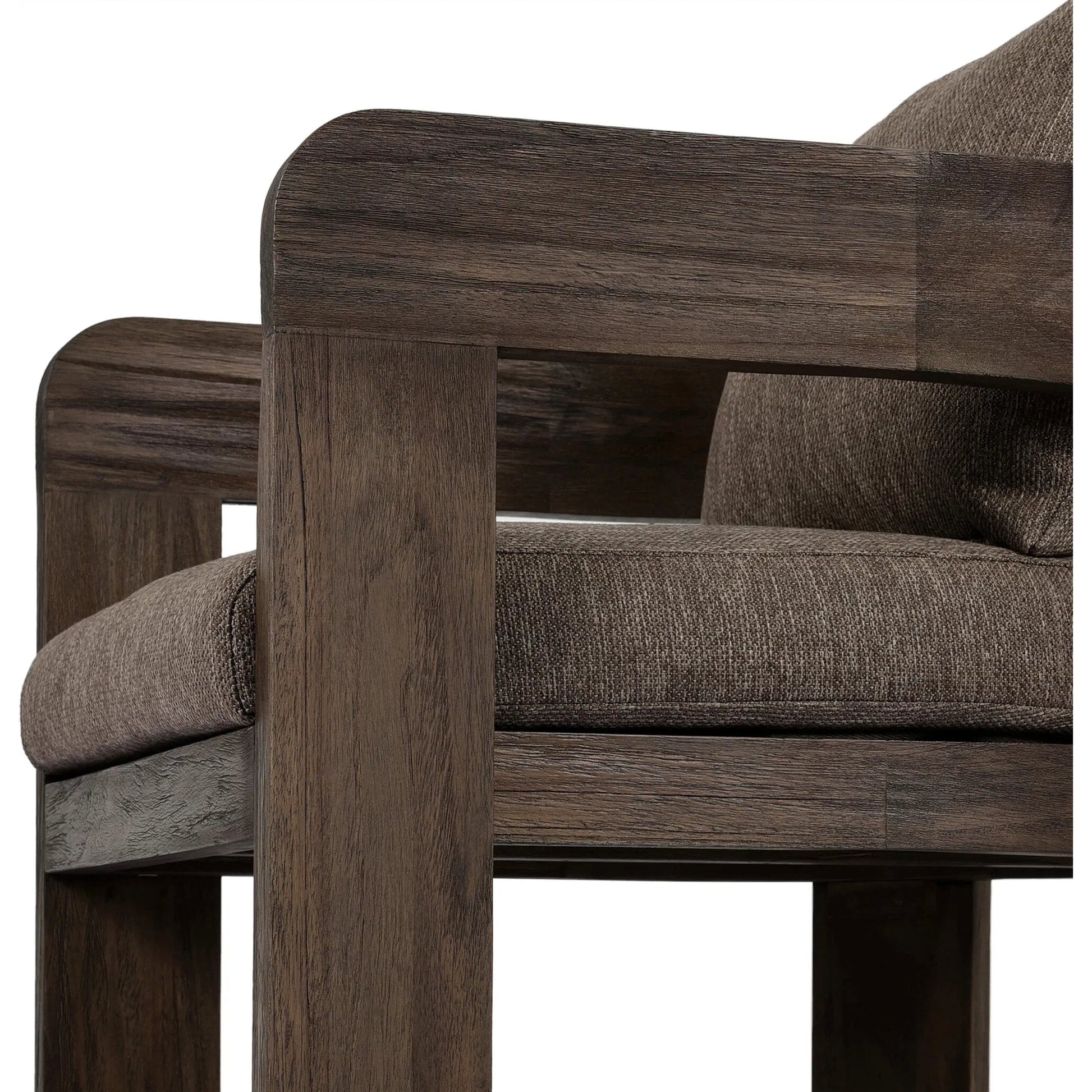 Jackson Outdoor Dining Chair by Four Hands. Made from 100% olefin, solid fsc®-certified teak, 90% polyester fiber, 10% polyester fiber batting in a modern style.