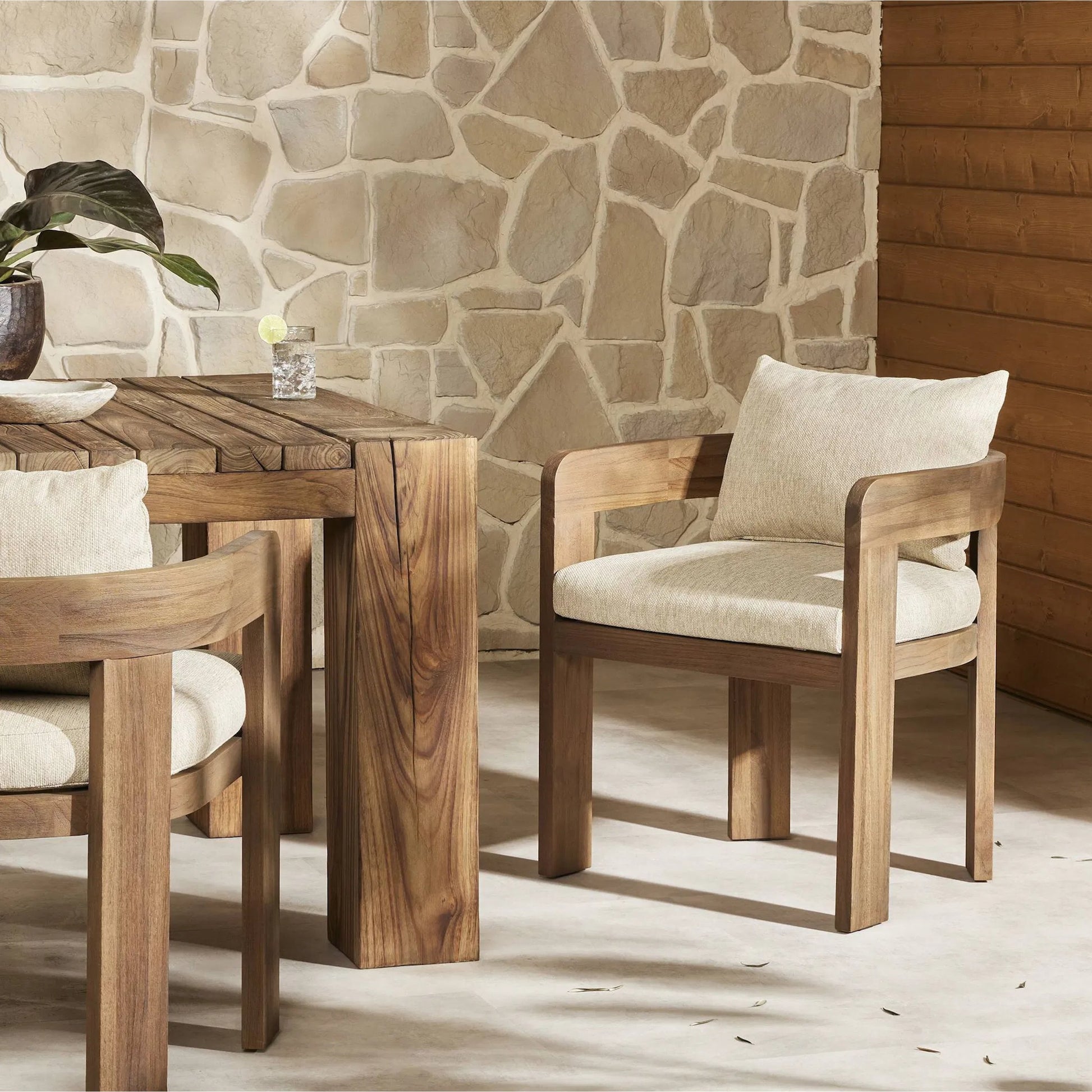 Jackson Outdoor Dining Chair by Four Hands. Made from 100% olefin, solid fsc®-certified teak, 90% polyester fiber, 10% polyester fiber batting in a modern style.