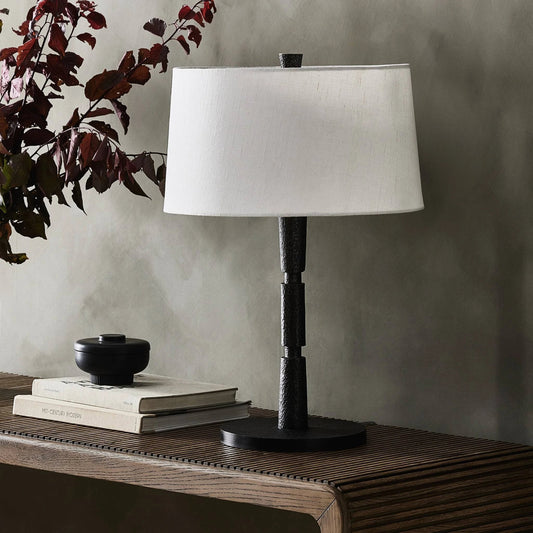 Fernando Table Lamp by Four Hands in forged black aluminum. Made from aluminum, 90% polyester, 10% cotton in a modern style.
