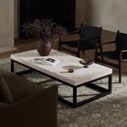 The Rectangular Coffee Table by Four Hands in travertine, bronze pebble texture. Made from solid travertine, iron in a modern style.