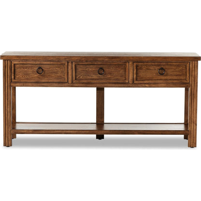 The Lazy Monsieur Partouche Table by Four Hands in distressed brown. Made from pine veneer, solid pine in a modern style.
