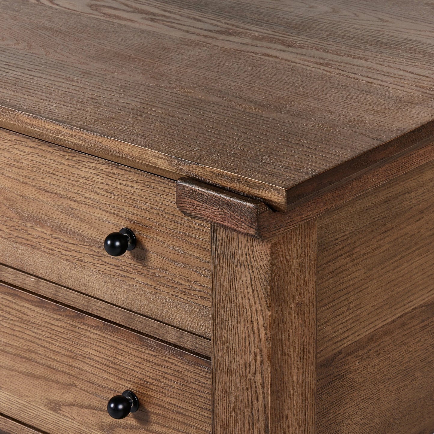 005 SI-2137331 | Closeup | Gardendale Kitchen Island by Four Hands in tan oak veneer. Made from oak veneer, iron, solid oak in a modern style.