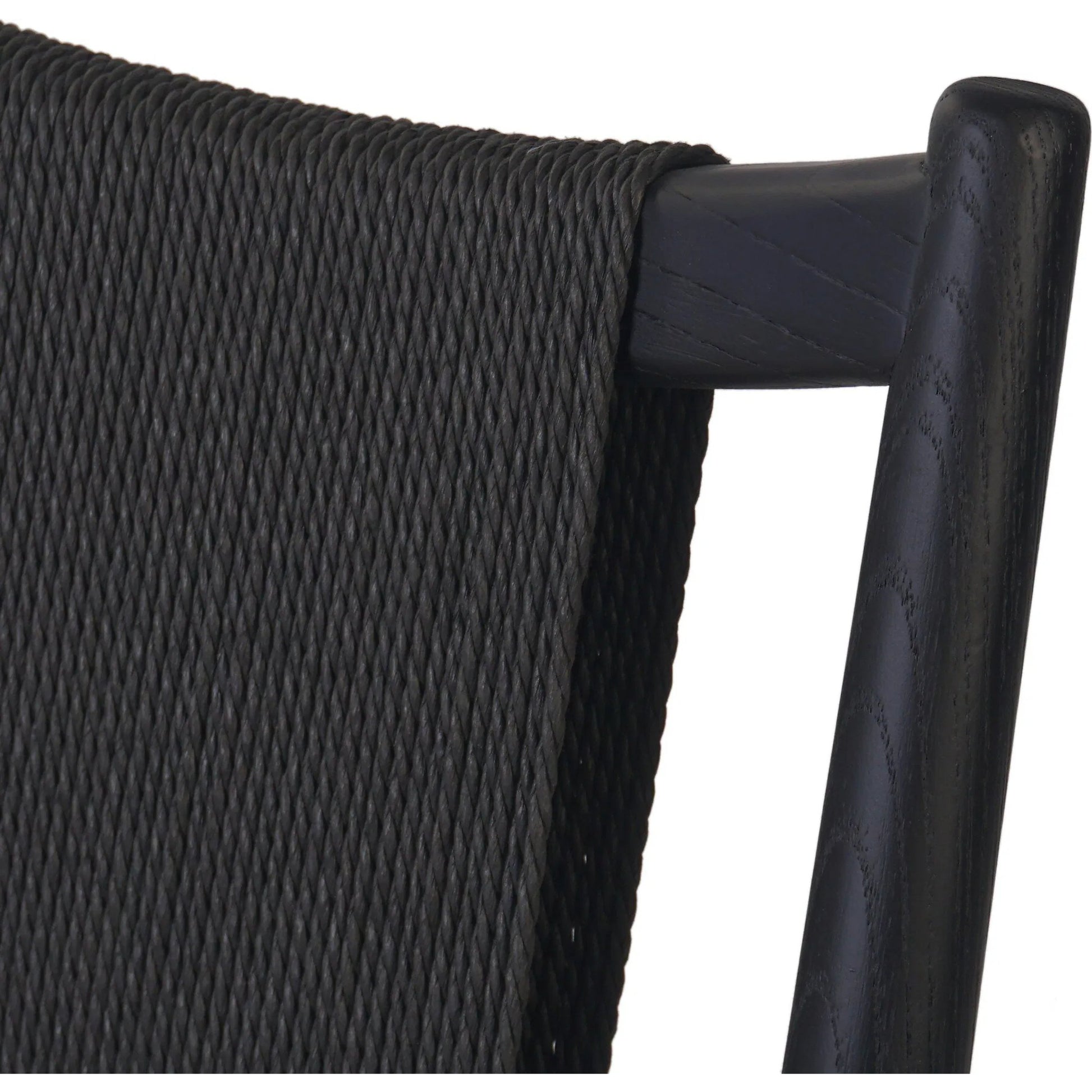 Haddon Dining Chair by Four Hands. Made from 39% linen, 35% cotton, 26% polyester, solid nettlewood, rush in a unique style.