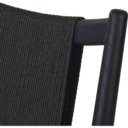 Haddon Dining Chair by Four Hands. Made from 39% linen, 35% cotton, 26% polyester, solid nettlewood, rush in a unique style.