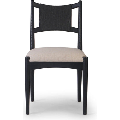Haddon Dining Chair by Four Hands. Made from 39% linen, 35% cotton, 26% polyester, solid nettlewood, rush in a unique style.