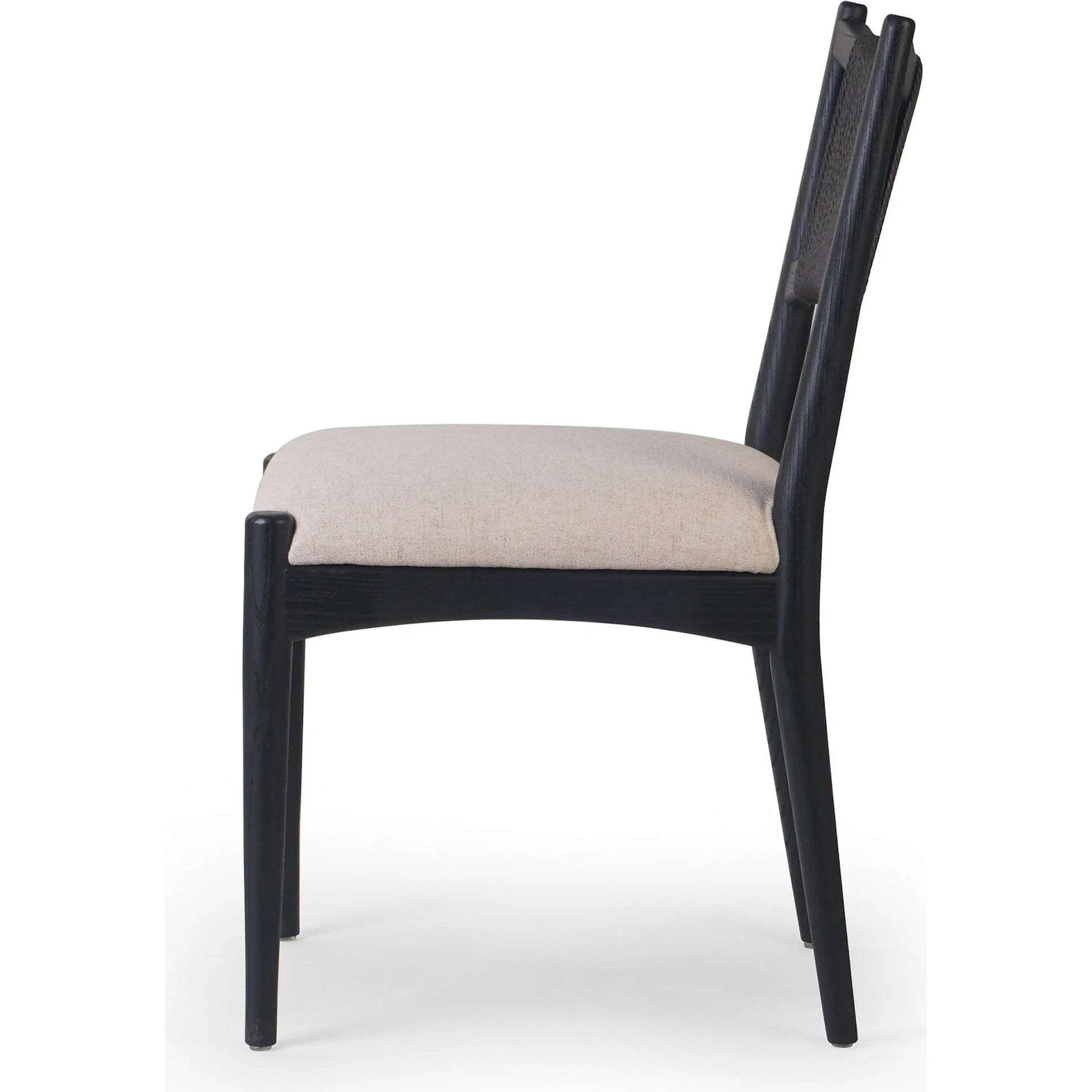 Haddon Dining Chair by Four Hands. Made from 39% linen, 35% cotton, 26% polyester, solid nettlewood, rush in a unique style.