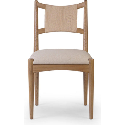 Haddon Dining Chair by Four Hands. Made from 39% linen, 35% cotton, 26% polyester, solid nettlewood, rush in a unique style.