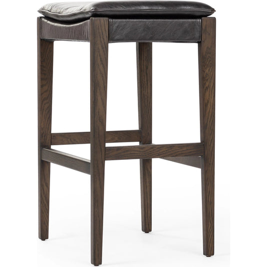 Aya Bar Stool by Four Hands in sonoma black and burnt oak. Made from top grain leather, solid oak, 100% polyester in a modern style.