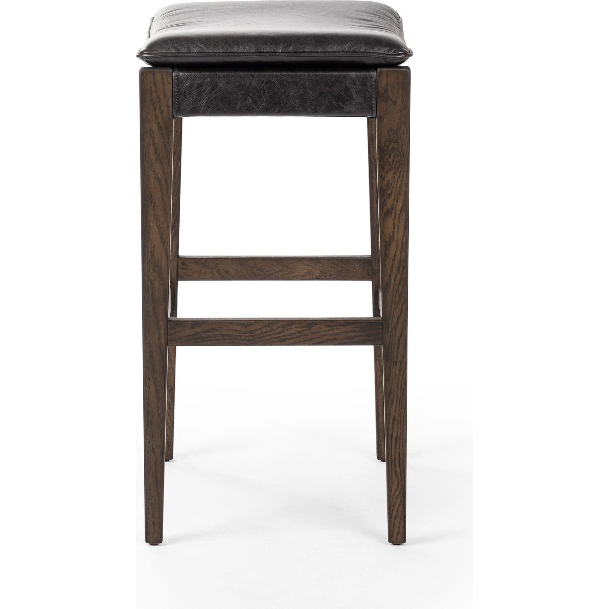 Aya Bar Stool by Four Hands in sonoma black and burnt oak. Made from top grain leather, solid oak, 100% polyester in a modern style.