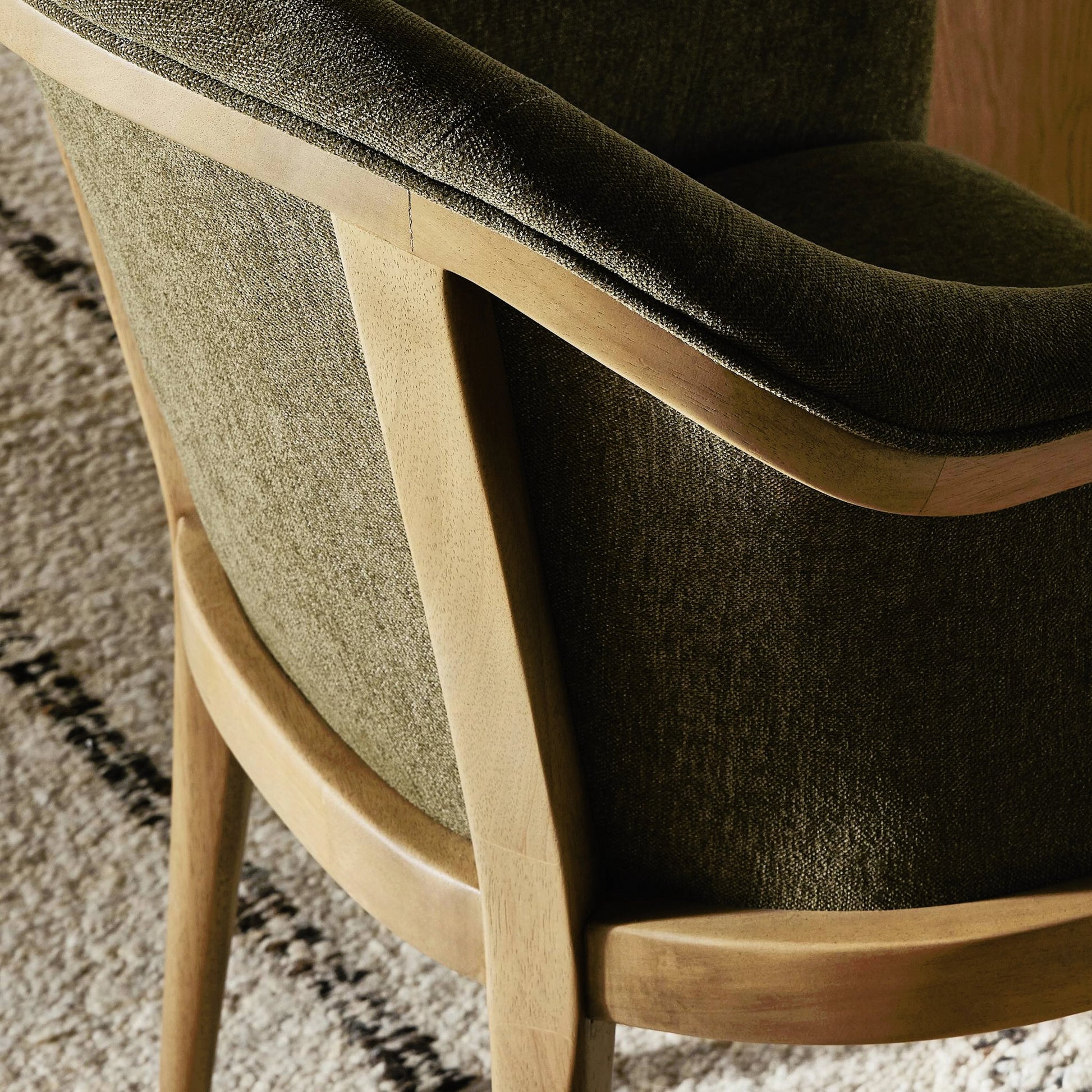 Colston Dining Chair by Four Hands in sutton olive. Made from 100% polyester, solid parawood in a modern style.