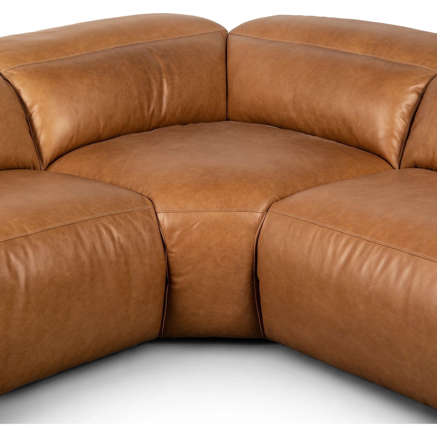 018 SI-2001827 | Closeup | Radley Power Recliner 5-Piece Sectional by Four Hands in sonoma butterscotch. Made from top grain leather, 100% polyester fiber, eucalyptus plywood in a modern style.