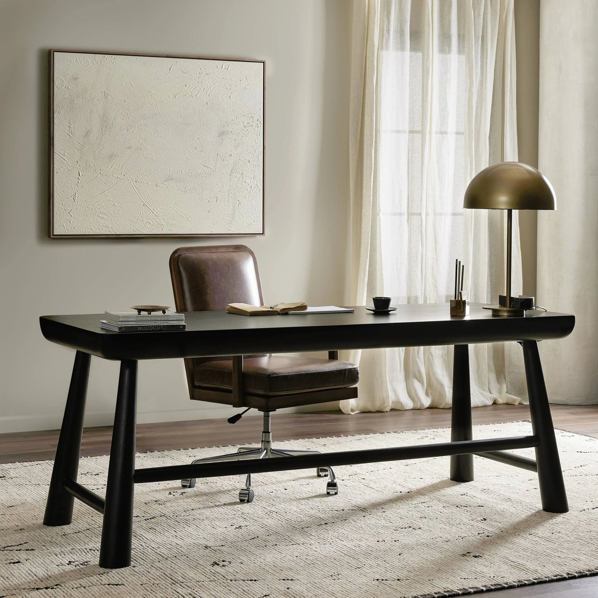Lorik Desk by Four Hands in worn black acacia. Made from solid acacia in a modern style.