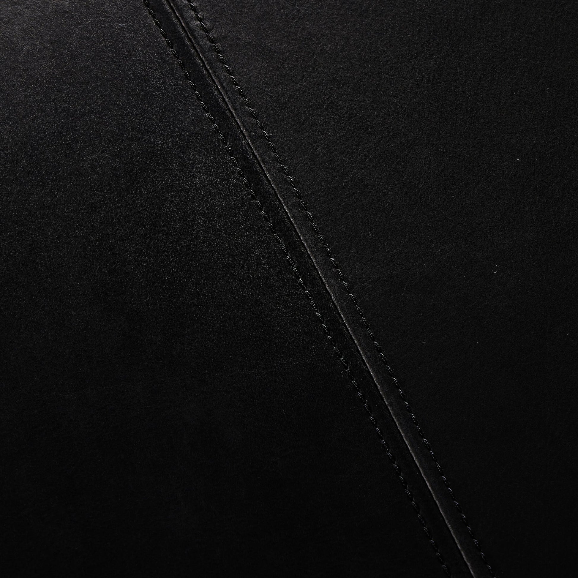 Brickel Backless Bench by Four Hands in heirloom black. Made from top grain leather, iron, 100% polyester in a modern style.