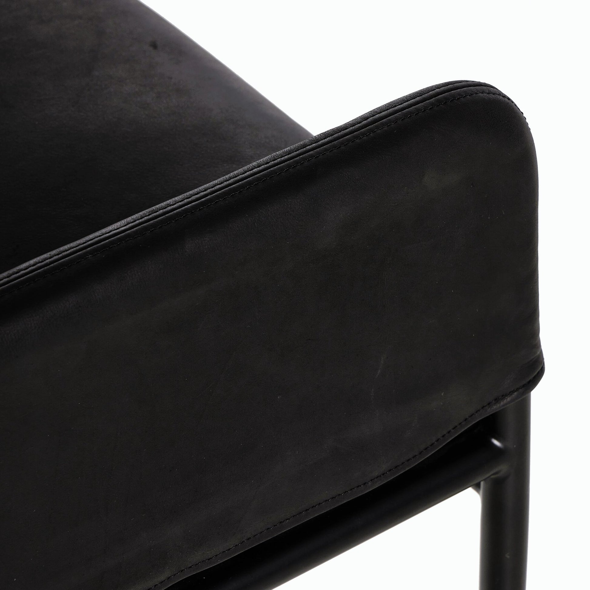 Brickel Backless Bench by Four Hands in heirloom black. Made from top grain leather, iron, 100% polyester in a modern style.