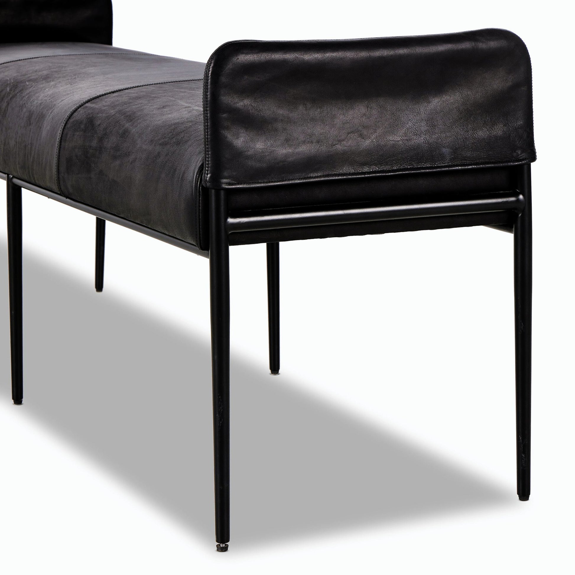 Brickel Backless Bench by Four Hands in heirloom black. Made from top grain leather, iron, 100% polyester in a modern style.