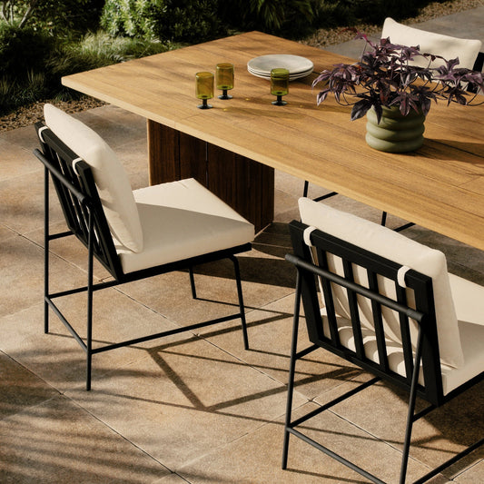 Crete Outdoor Dining Chair by Four Hands. Made from 100% acrylic, iron, solid teak in a modern style.