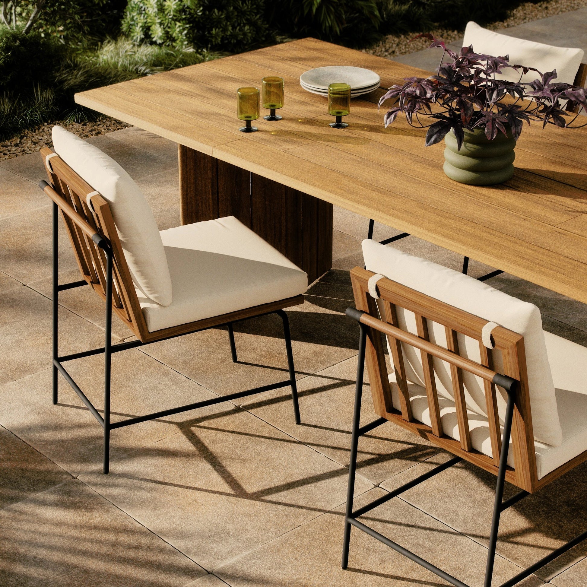 Crete Outdoor Dining Chair by Four Hands. Made from 100% acrylic, iron, solid teak in a modern style.