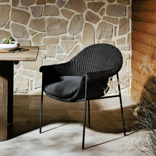 Suerte Outdoor Dining Chair by Four Hands. Made from 100% acrylic, iron, 100% polyethylene in a modern style.