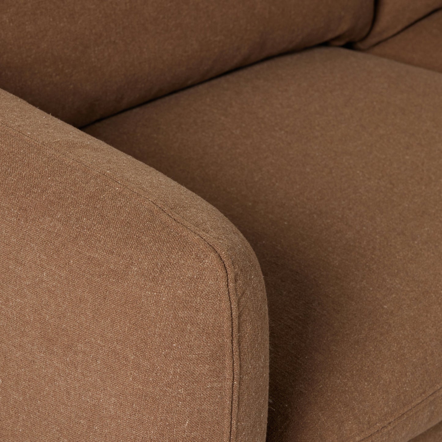009 SI-2074379 | Closeup | Ingel 4-Piece Sectional with Ottoman by Four Hands in antwerp cafe. Made from 39% linen, 35% cotton, 26% polyester, poplar plywood, 100% polyester in a modern style.