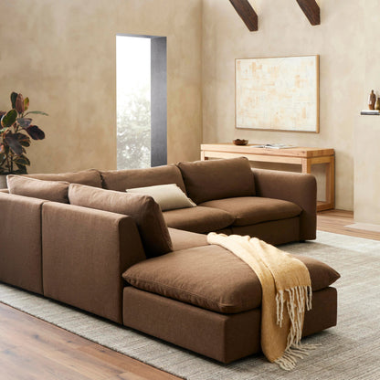 Ingel 4-Piece Sectional with Ottoman by Four Hands in antwerp cafe. Made from 39% linen, 35% cotton, 26% polyester, poplar plywood, 100% polyester in a modern style.