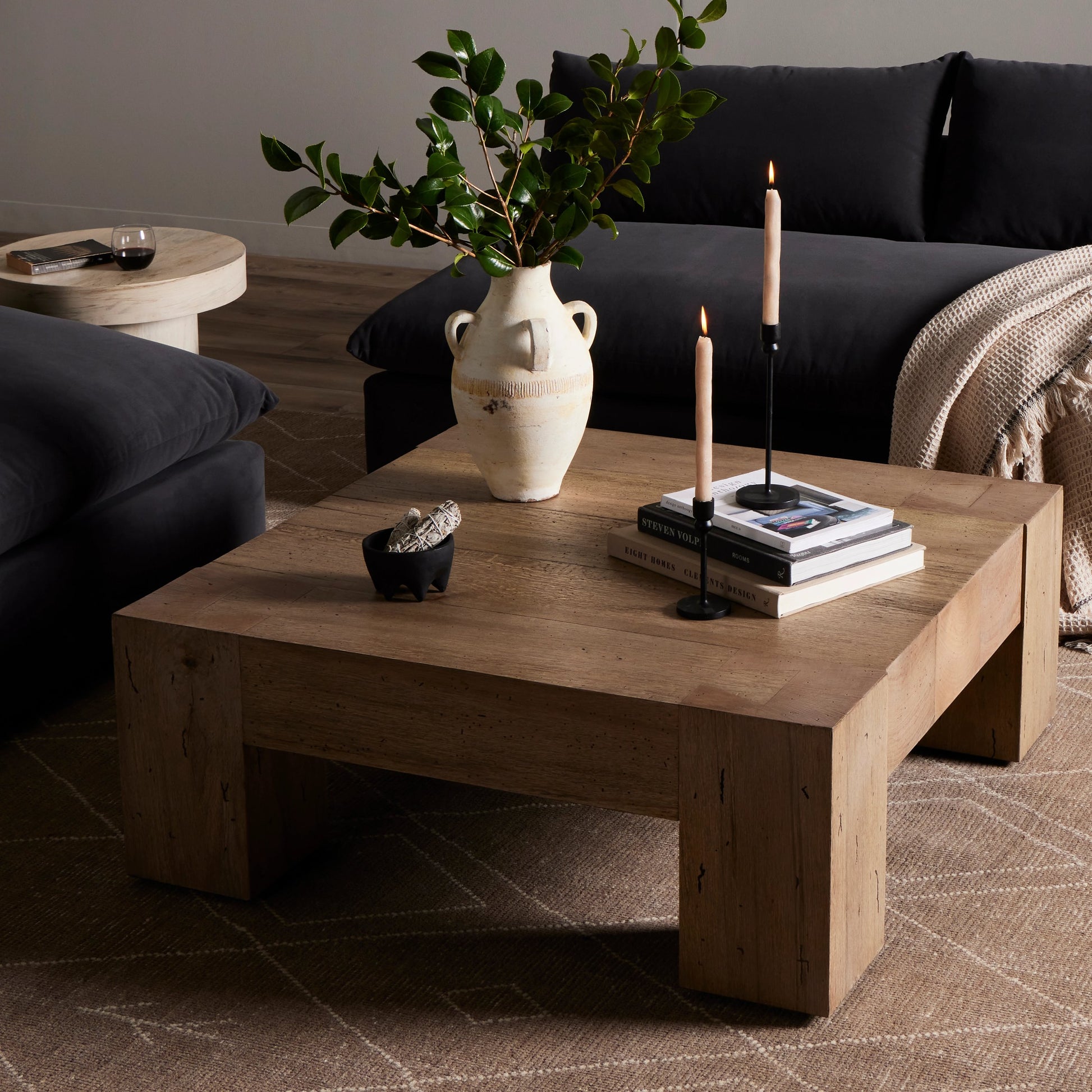 Abaso Small Square Coffee Table by Four Hands in ebony rustic wormwood oak. Made from thick oak veneer, engineered hardwood in a modern style.