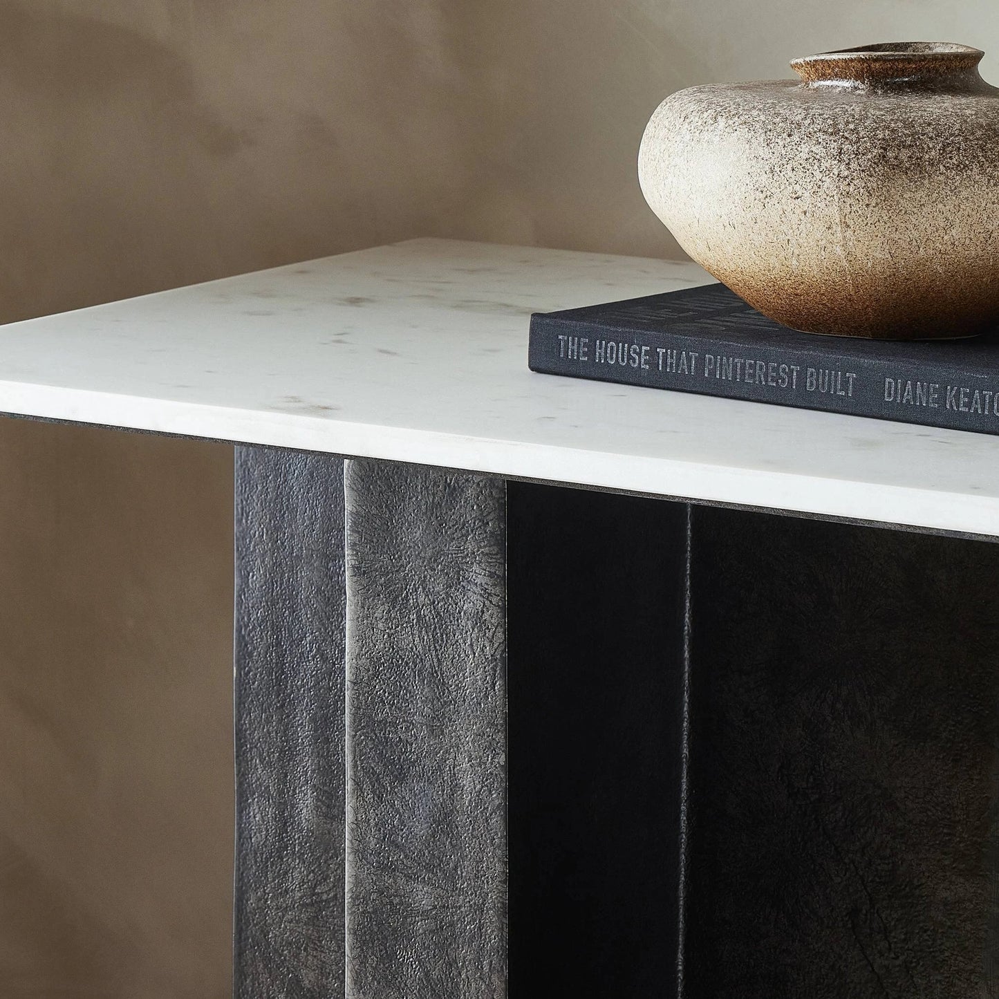 014 SI-2137625 | Closeup | Terrell Large Console Table by Four Hands in polished white marble, raw black. Made from solid marble, aluminum, engineered hardwood in a modern style.