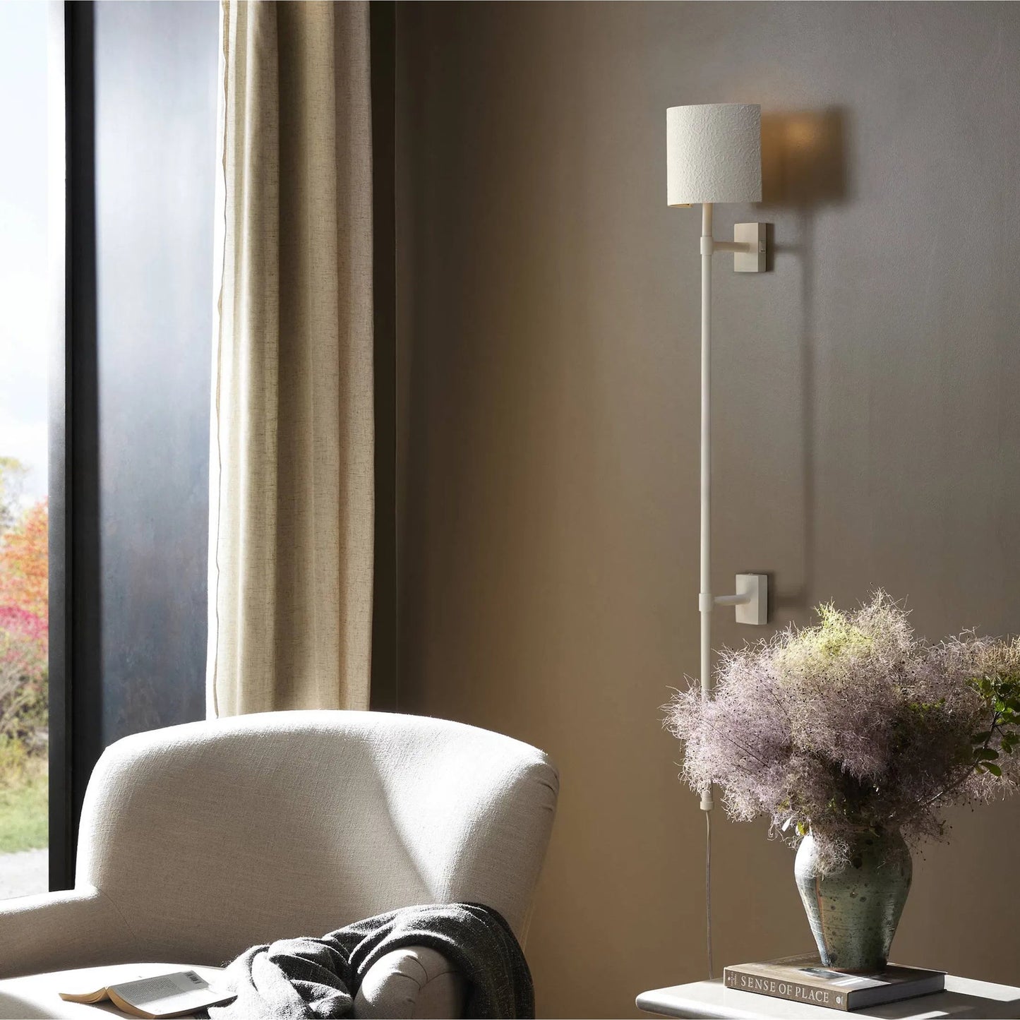 006 SI-2635330 | Lifestyle | Maurice Sconce by Four Hands in matte white plaster, matte white iron. Made from iron in a unique style.