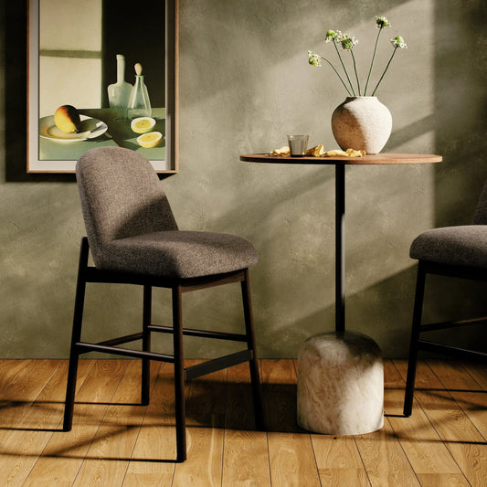 Sora Armless Bar + Counter Stool by Four Hands in gibson mink, mocha ash, black iron and gibson mink. Made from 97% polyester, 3% acrylic, solid ash, iron in a modern style.