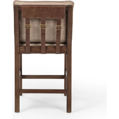 Wilmington Counter Stool by Four Hands in alcala fawn and almond nettlewood, sonoma coco. Made from 70% polyester, 20% viscose (rayon), 10% flax, linen, solid nettlewood, top grain leather in a modern style.