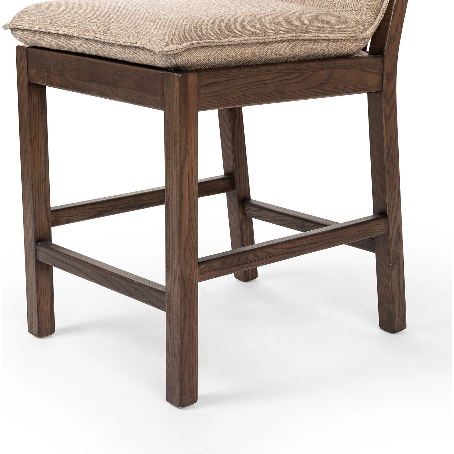 008 SI-2137724 | Closeup | Wilmington Counter Stool by Four Hands in alcala fawn and almond nettlewood, sonoma coco. Made from 70% polyester, 20% viscose (rayon), 10% flax, linen, solid nettlewood, top grain leather in a modern style.
