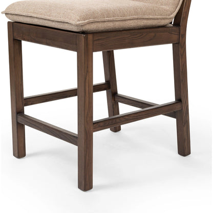 Wilmington Counter Stool by Four Hands in alcala fawn and almond nettlewood, sonoma coco. Made from 70% polyester, 20% viscose (rayon), 10% flax, linen, solid nettlewood, top grain leather in a modern style.